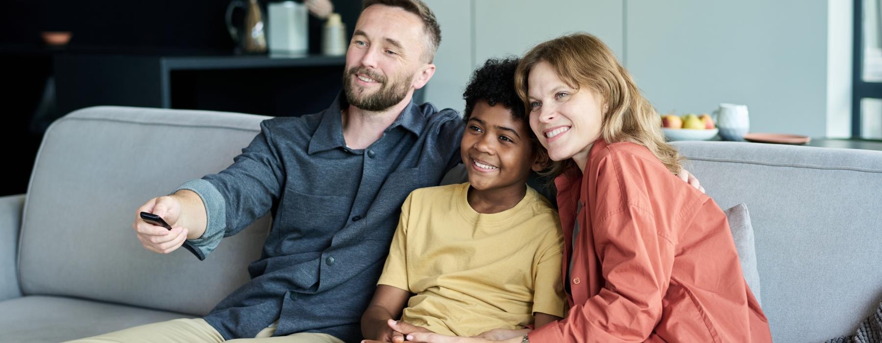 a group of people sitting on a couch