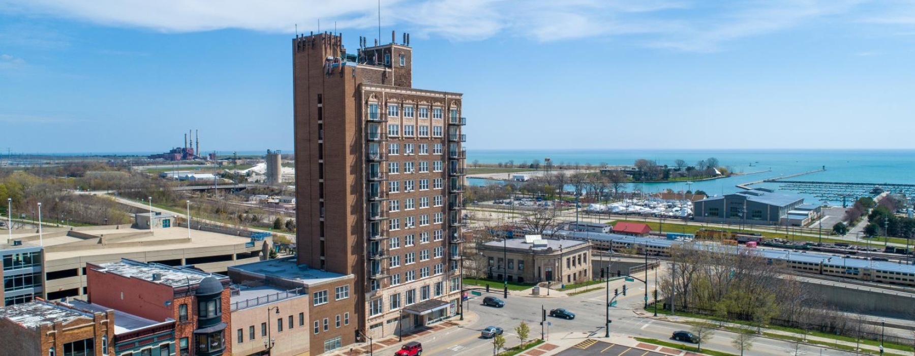 Exterior view of Harbor View Apartments community near downtown Waukegan and Lake Michigan.